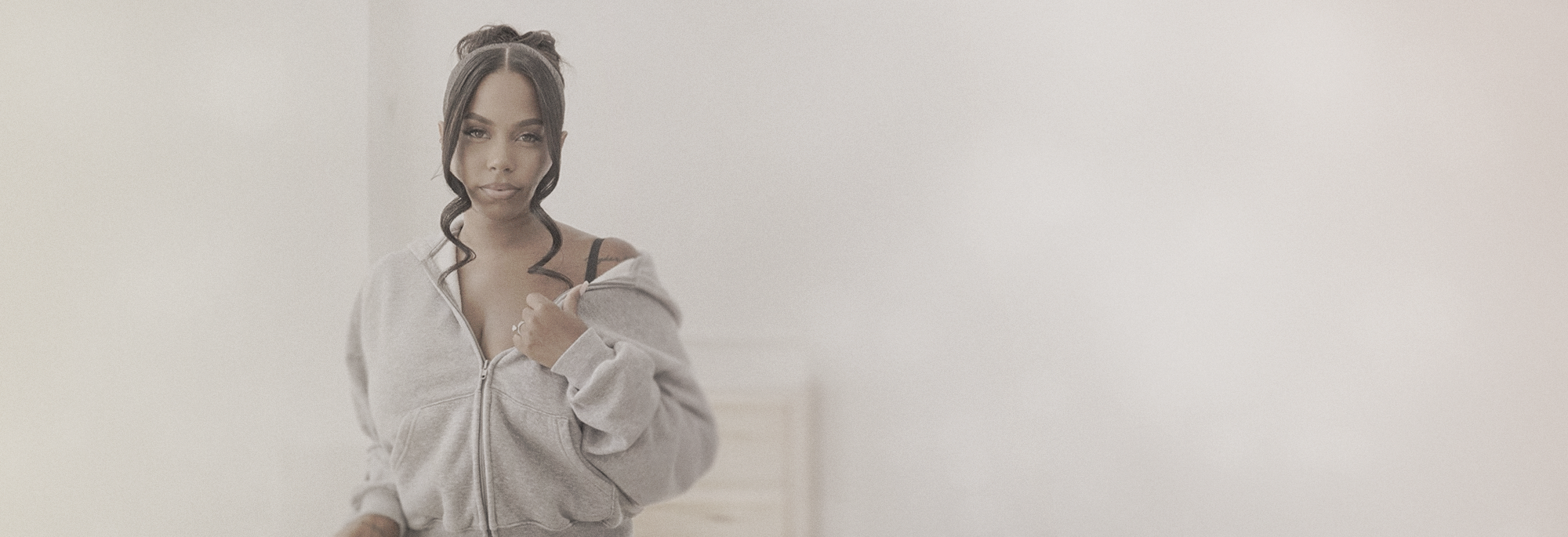 Cheynee in grey hoodie