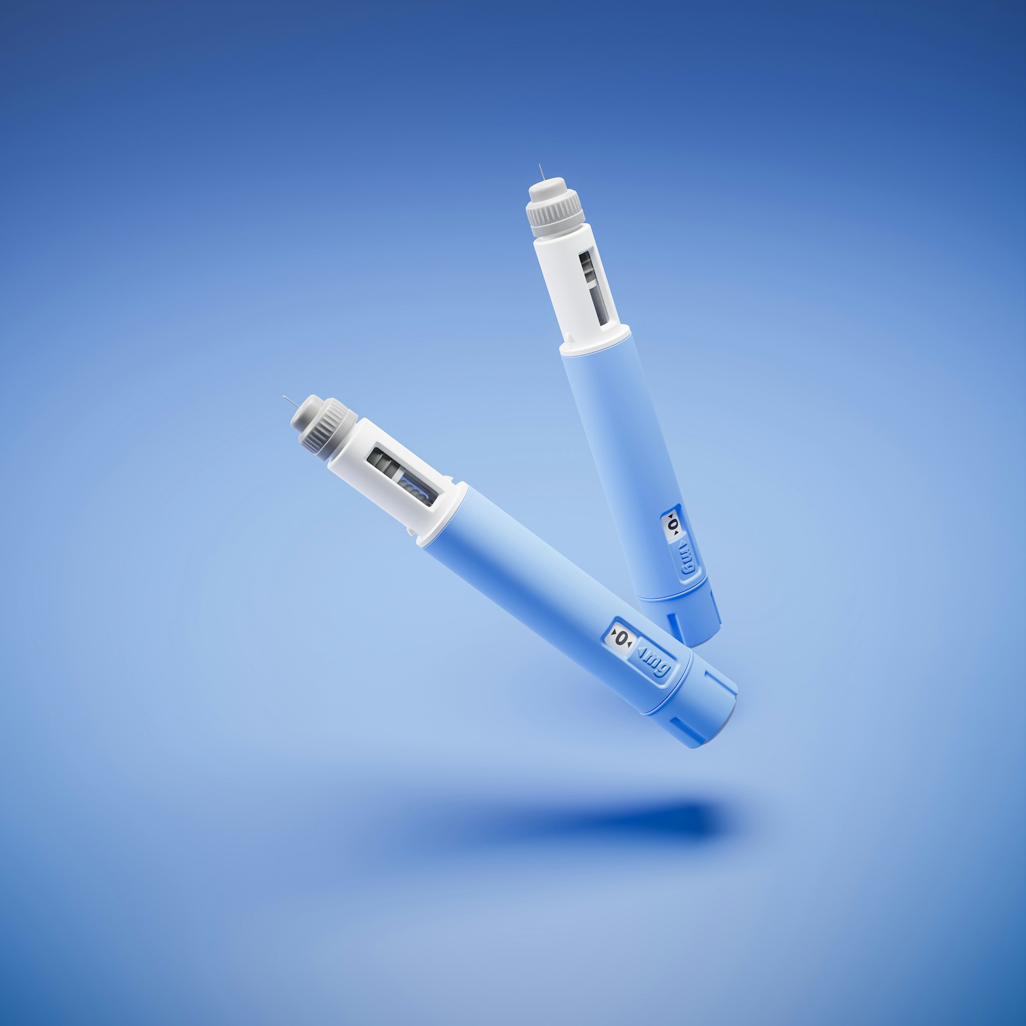 Two injectors / dosing pens for subcutaneous injection of antidiabetic medication or anti-obesity medication hovering over a blue background