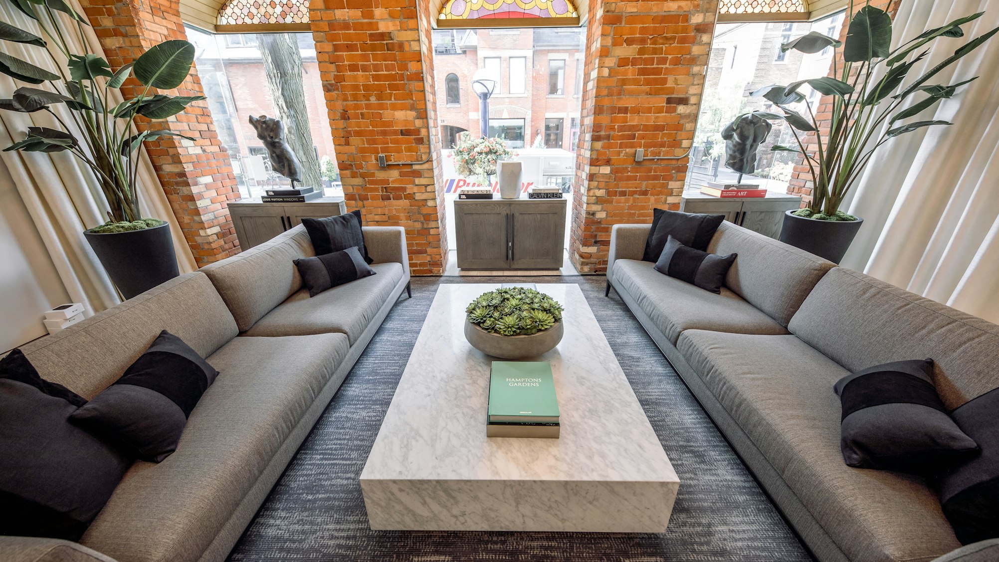 Image of our Toronto Airsculpt office - two couches with a table in between