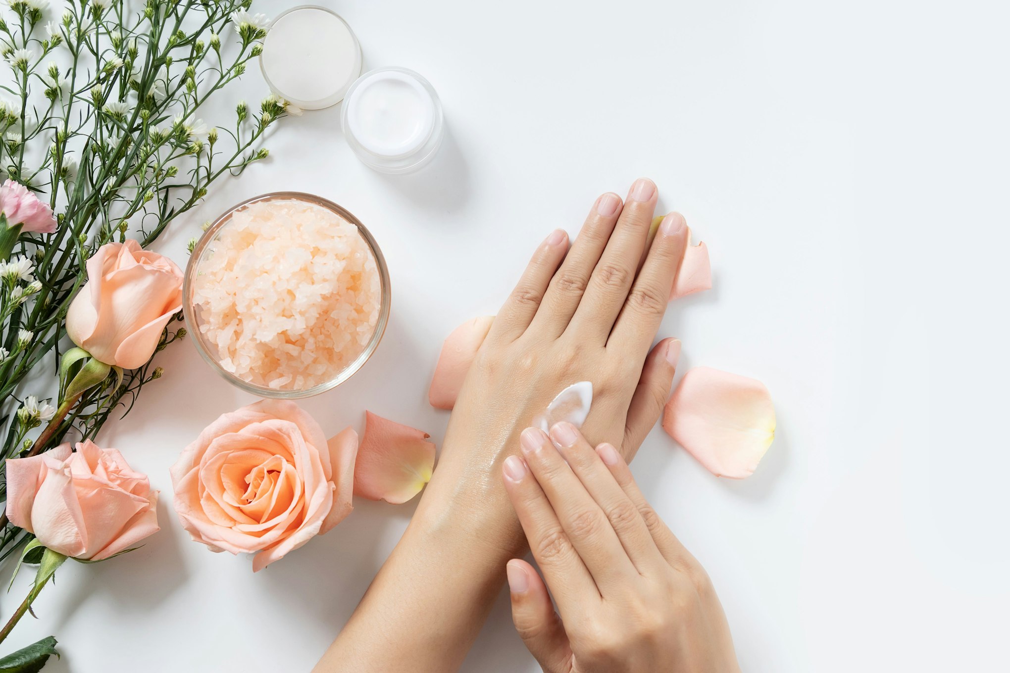 hands applying lotions