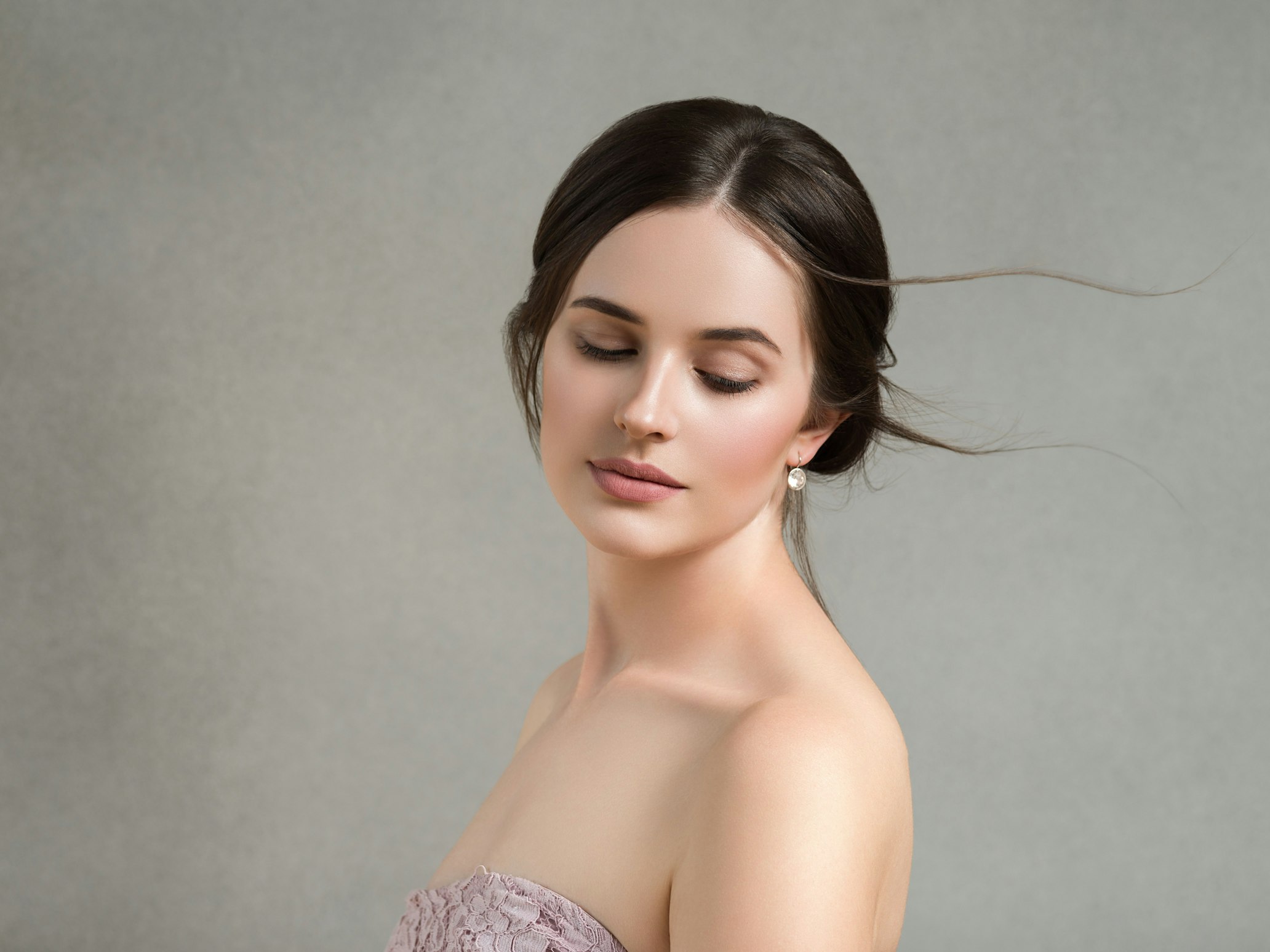 Woman with wind blowing hair