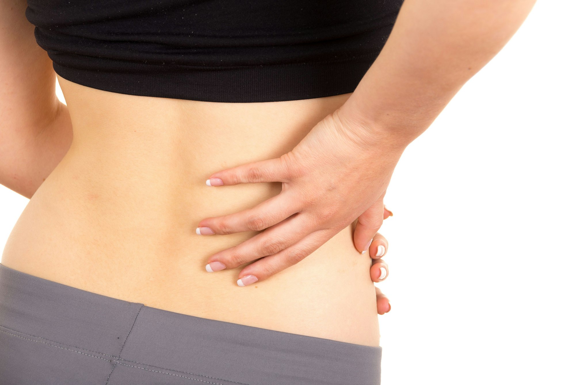 Woman grabbing lower back