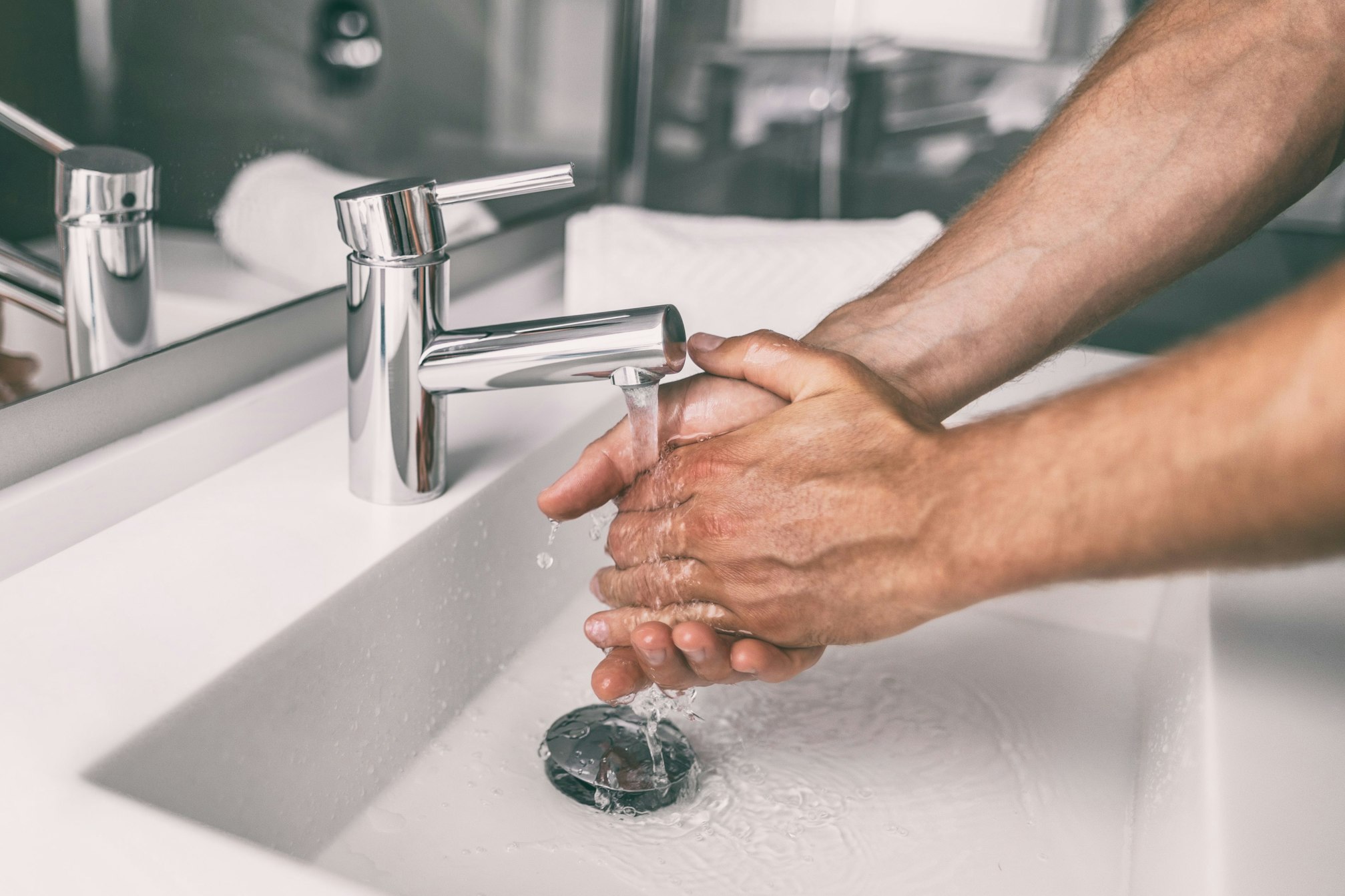 male washing hands