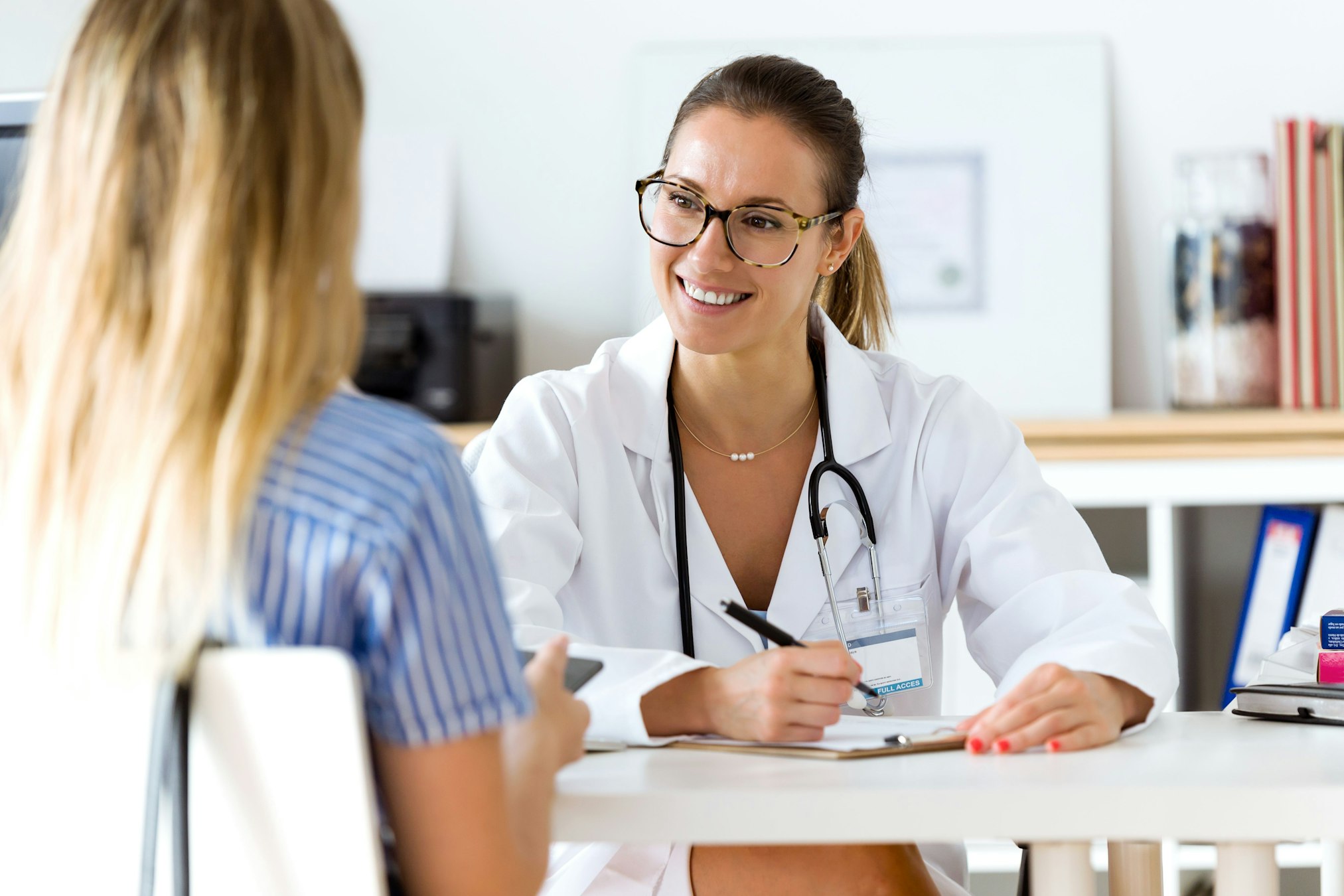 woman consulting with doctor