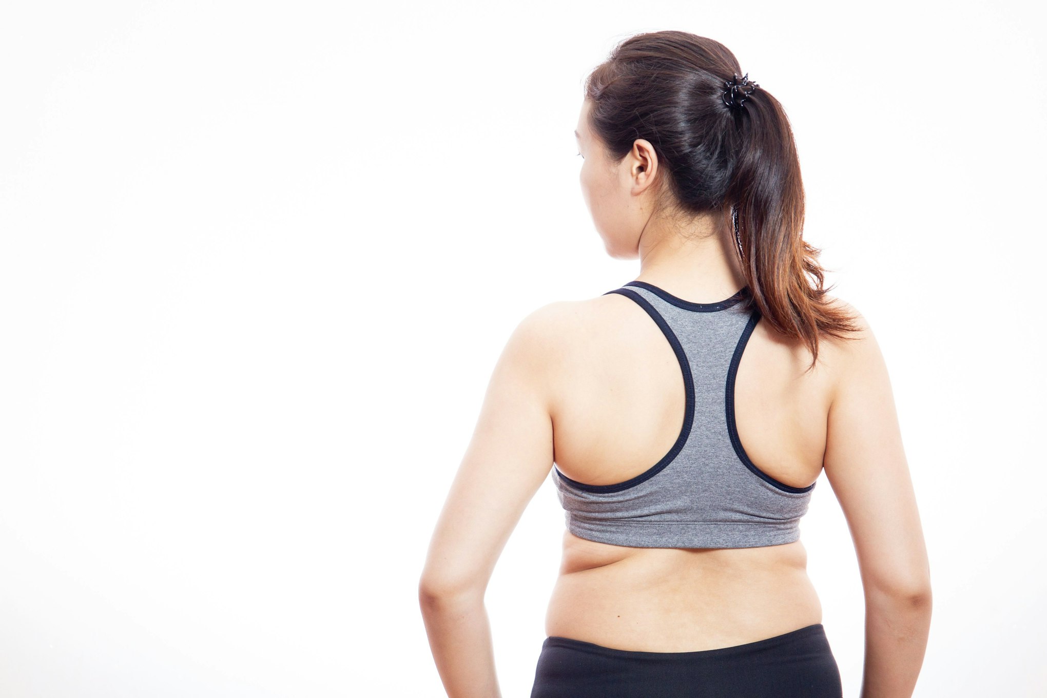 woman with back bra fat