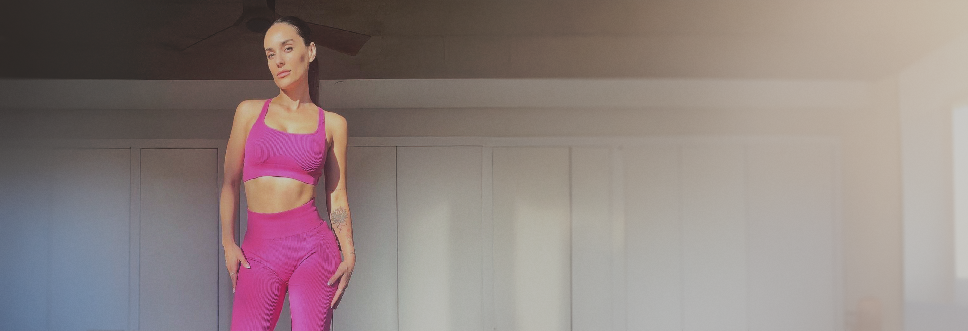 gabriela in pink work out outfit