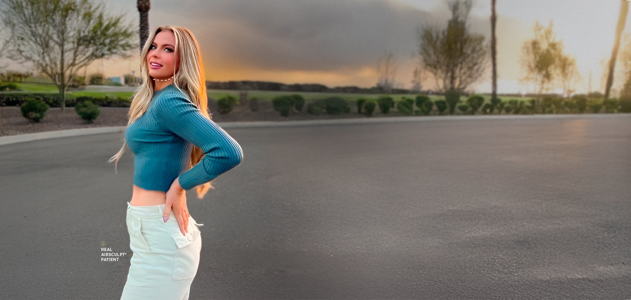 woman in blue top with white pants
