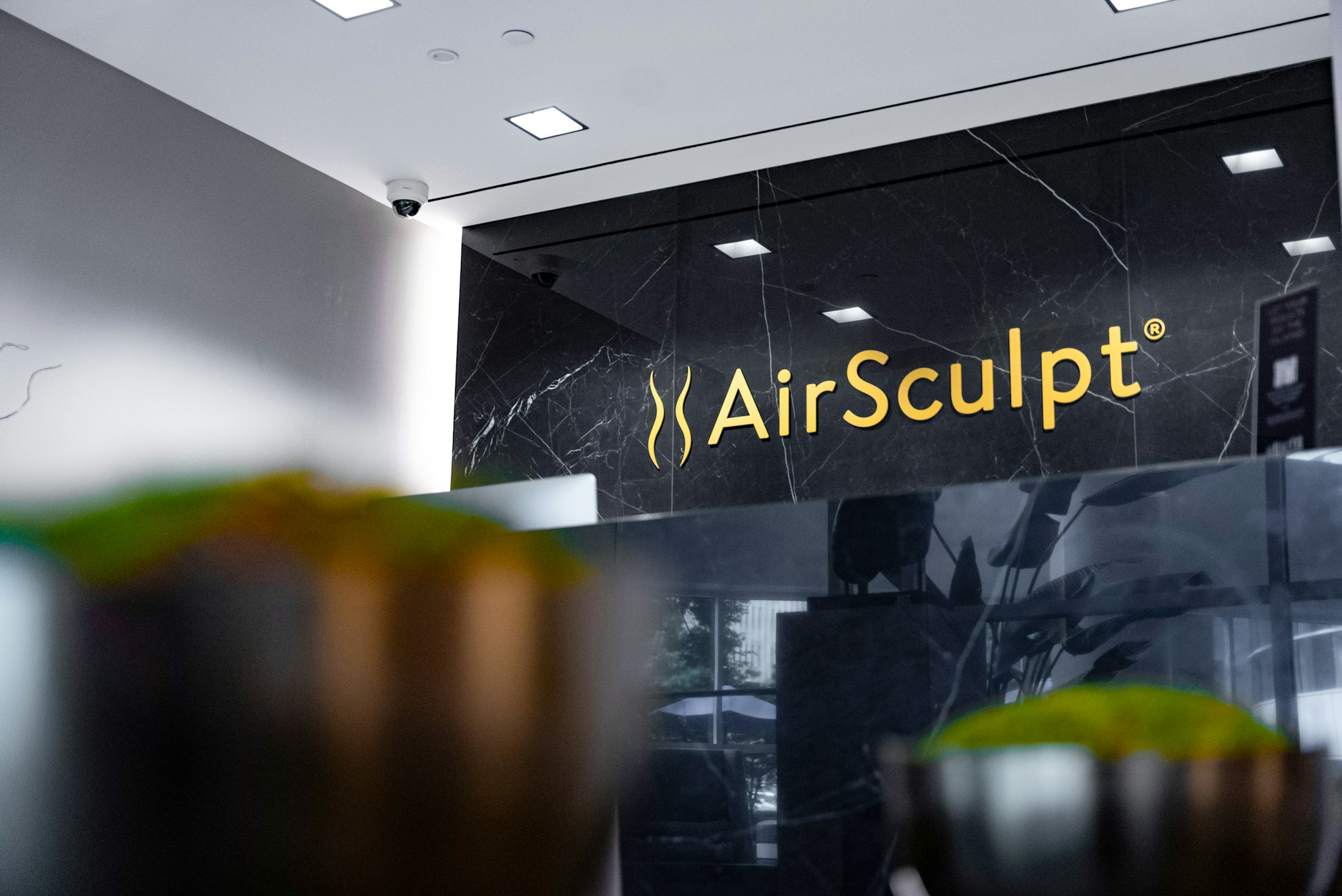 AirSculpt Body Contouring Atlanta clinic front desk backdrop