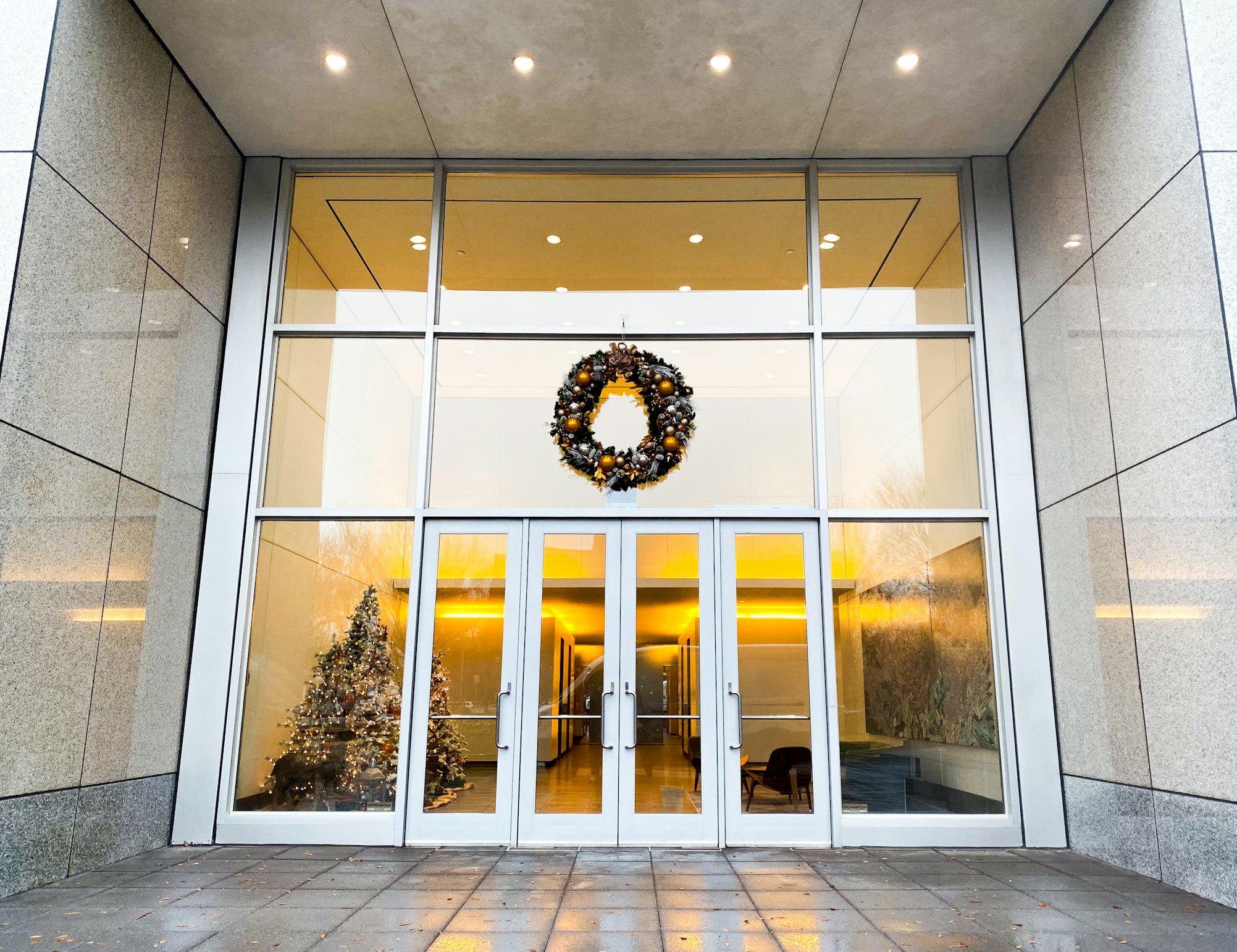 Exterior of AirSculpt Body Contouring Washington, D.C. clinic entrance with festive wreath