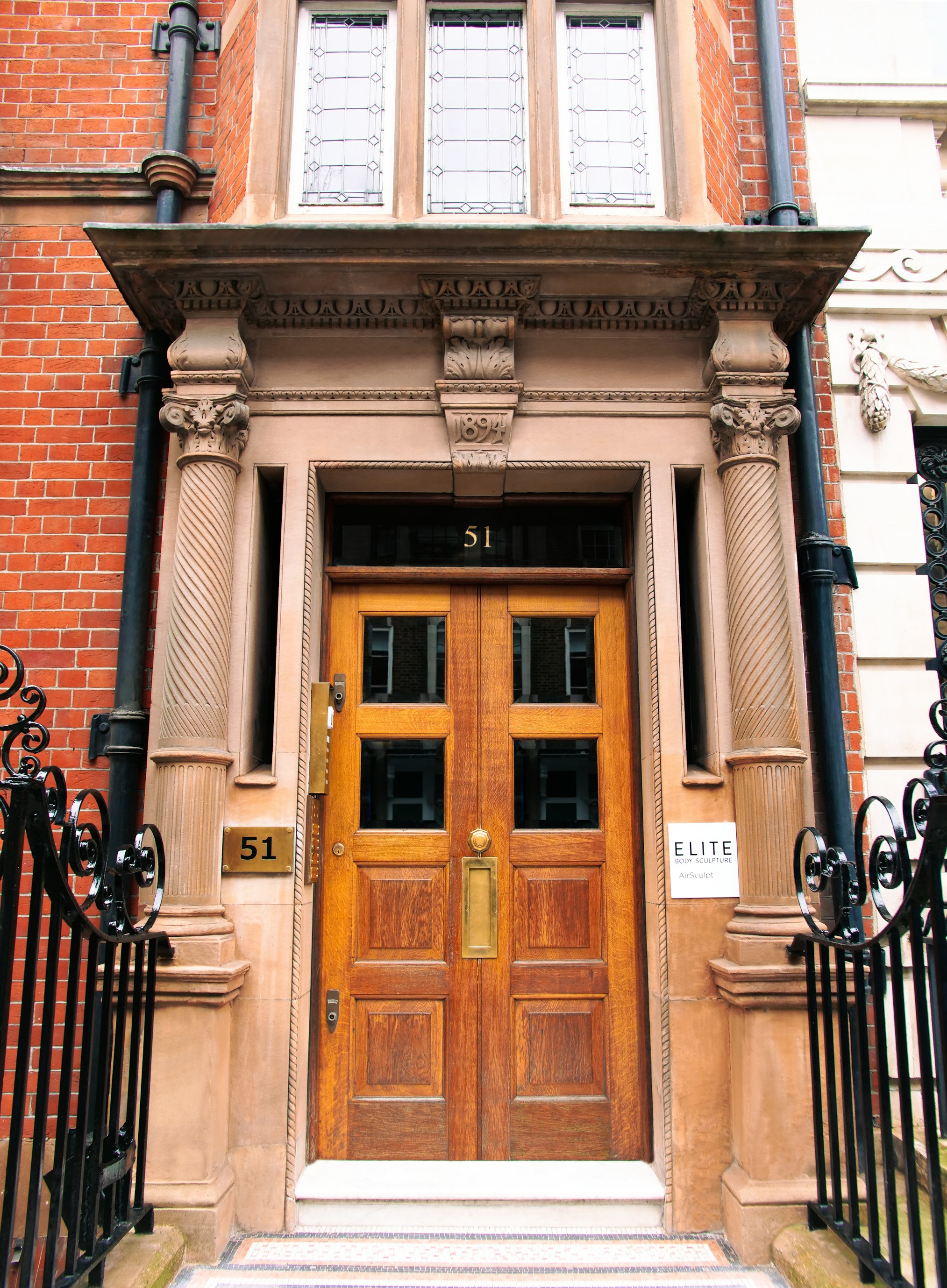 Exterior entrance with stone doorway of Elite Body Sculpture London clinic