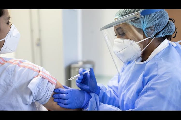 Getting people vaccinated with both doses could stop the virus in its tracks: Physician