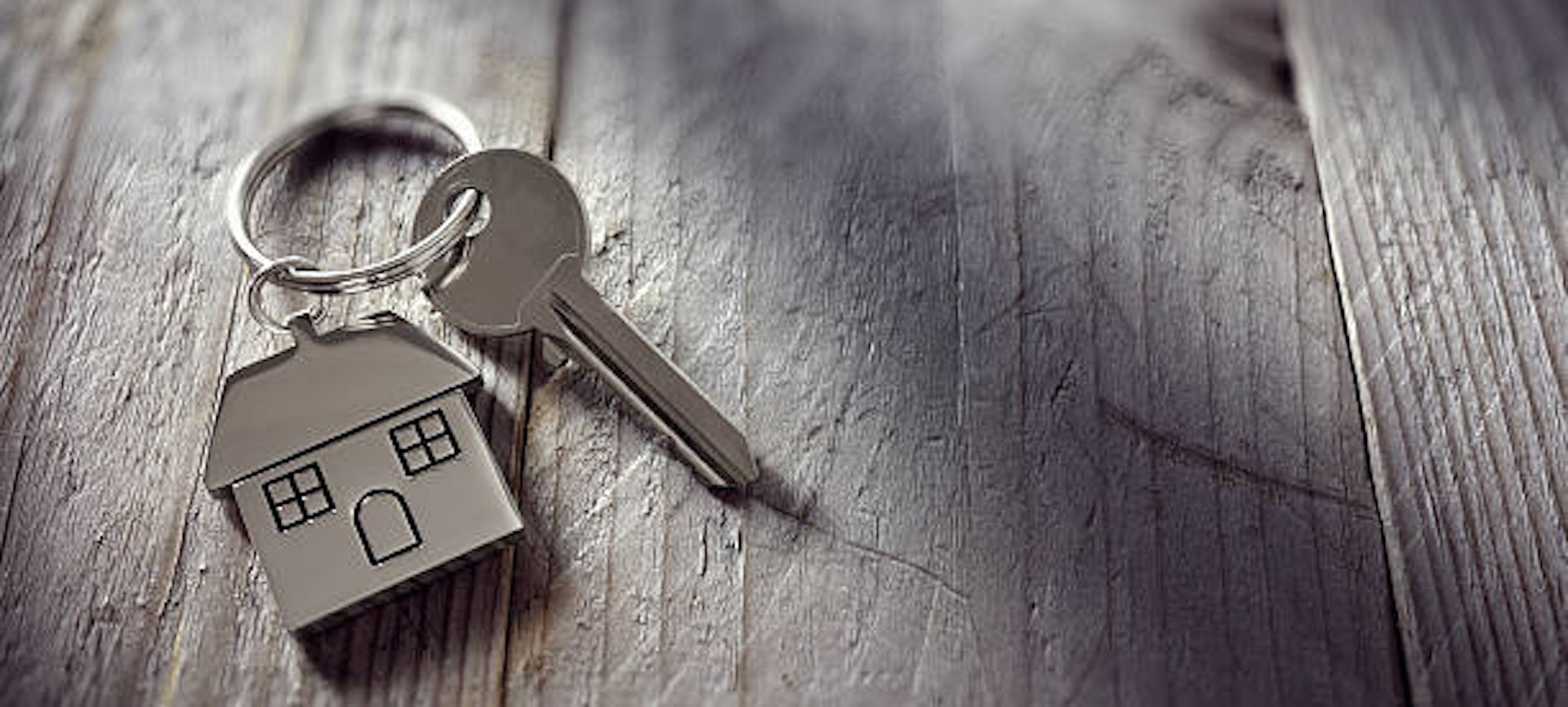 House key on a wooden table