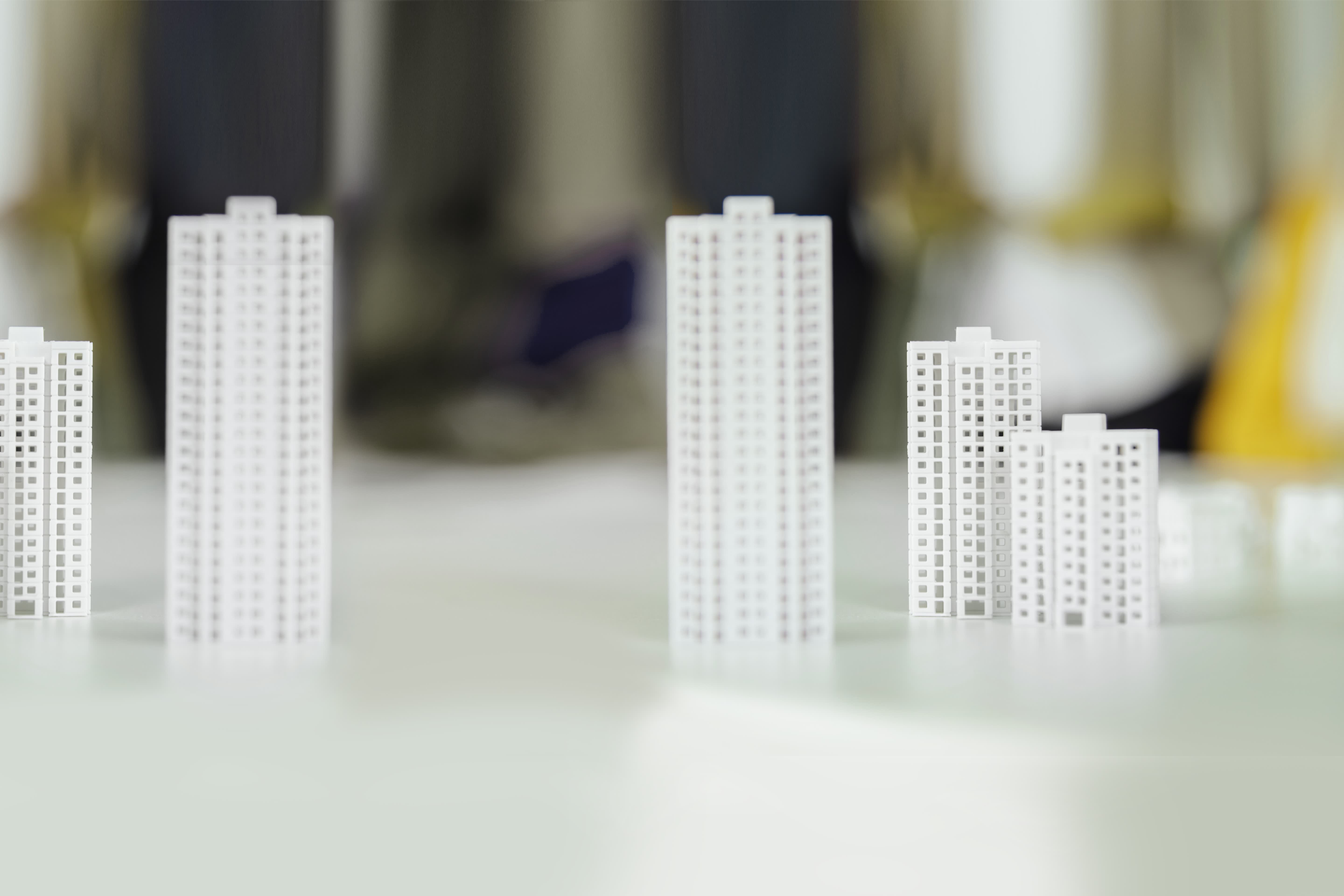 Models of high-rise buildings on table