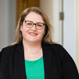 a headshot portrait of Stephanie Bulhoes