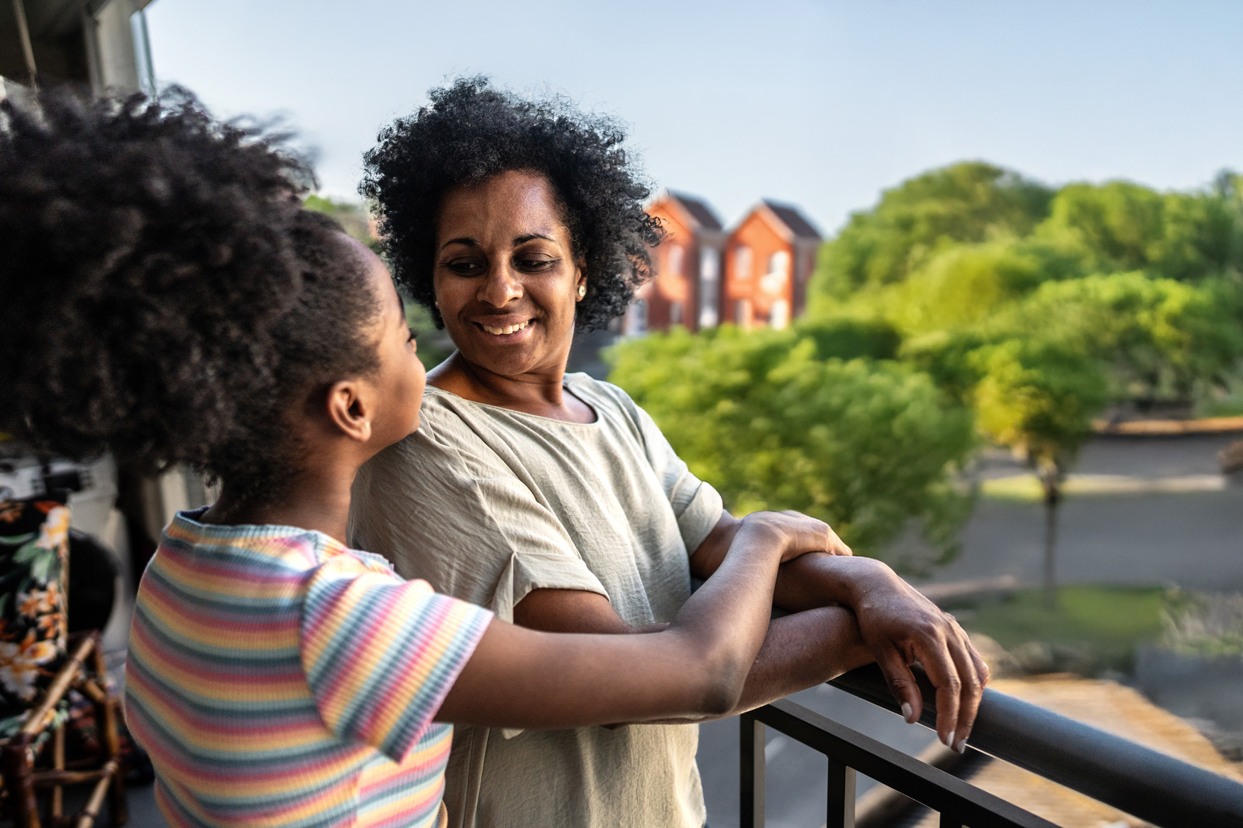 Woman and girl on a balcony