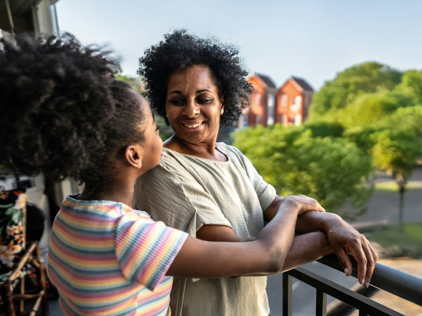 Woman and girl on a balcony