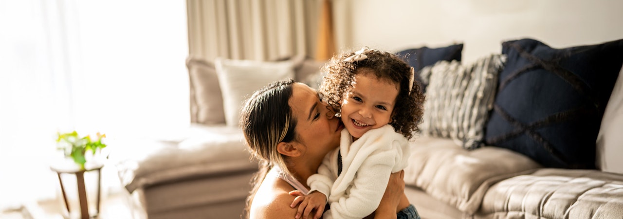 Woman holding daughter