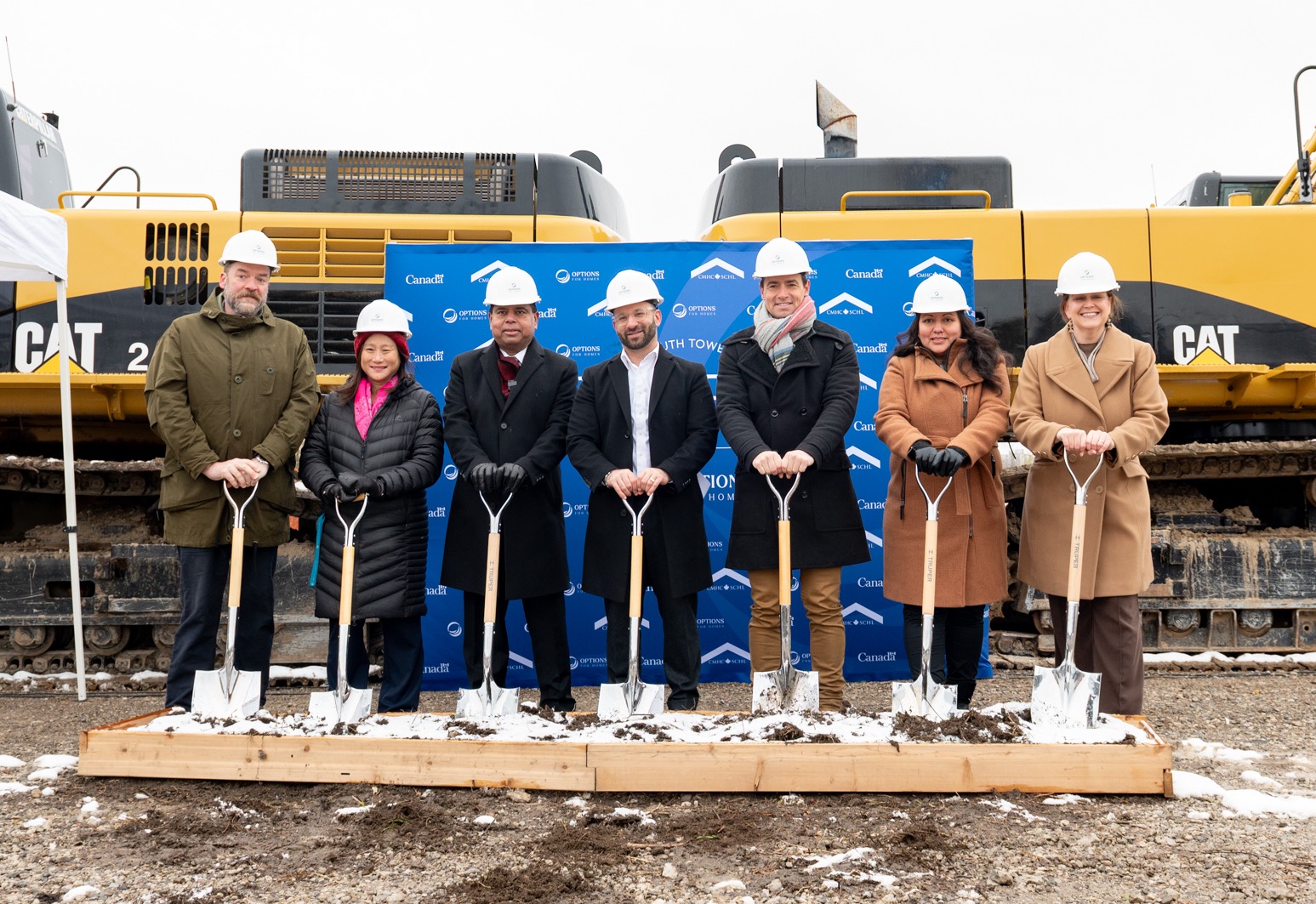 From left to right: Options For Homes Director of Development Geoffrey McGrath; Scarborough—Agincourt MP Jean Rip; Public Safety Minister and Scarborough— Guildwood—Rouge Park MP Gary Anandasangaree; Options for Homes CEO Daniel Ger; Secretary of State (Sport) and Burlington North—Milton West MP Adam van Koeverden; Options For Homes Senior Director of Sales and Marketing Sandra Hernandez; Parliamentary Secretary to the Minister of Housing and Infrastructure and Ajax MP Jennifer McKelvie. Credit: F.J. Sarmiento / Options for Homes