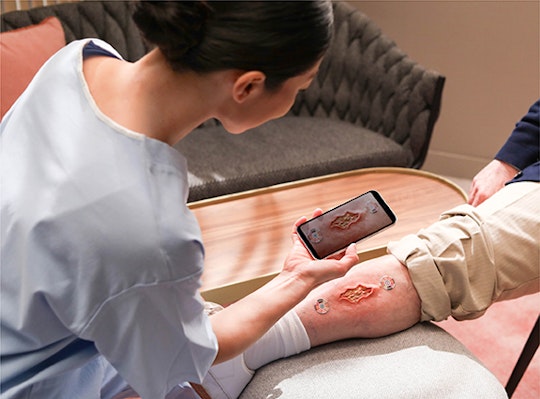 Nurse treating patient