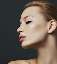 Close-up of the side of a red-headed woman's face