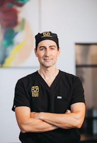 Dr. Rept in his scrubs