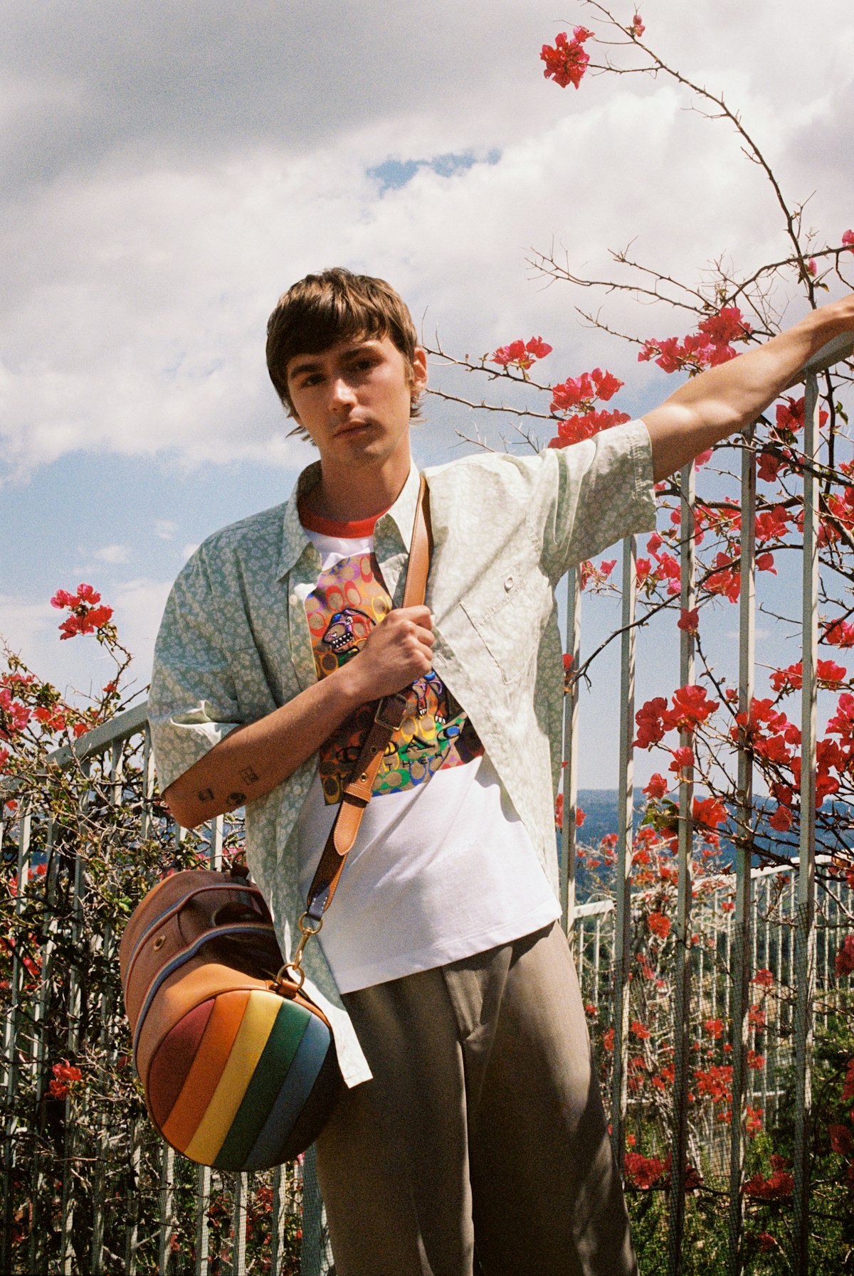 How '13 Reasons Why' Star Miles Heizer Celebrates Pride Coach Pride