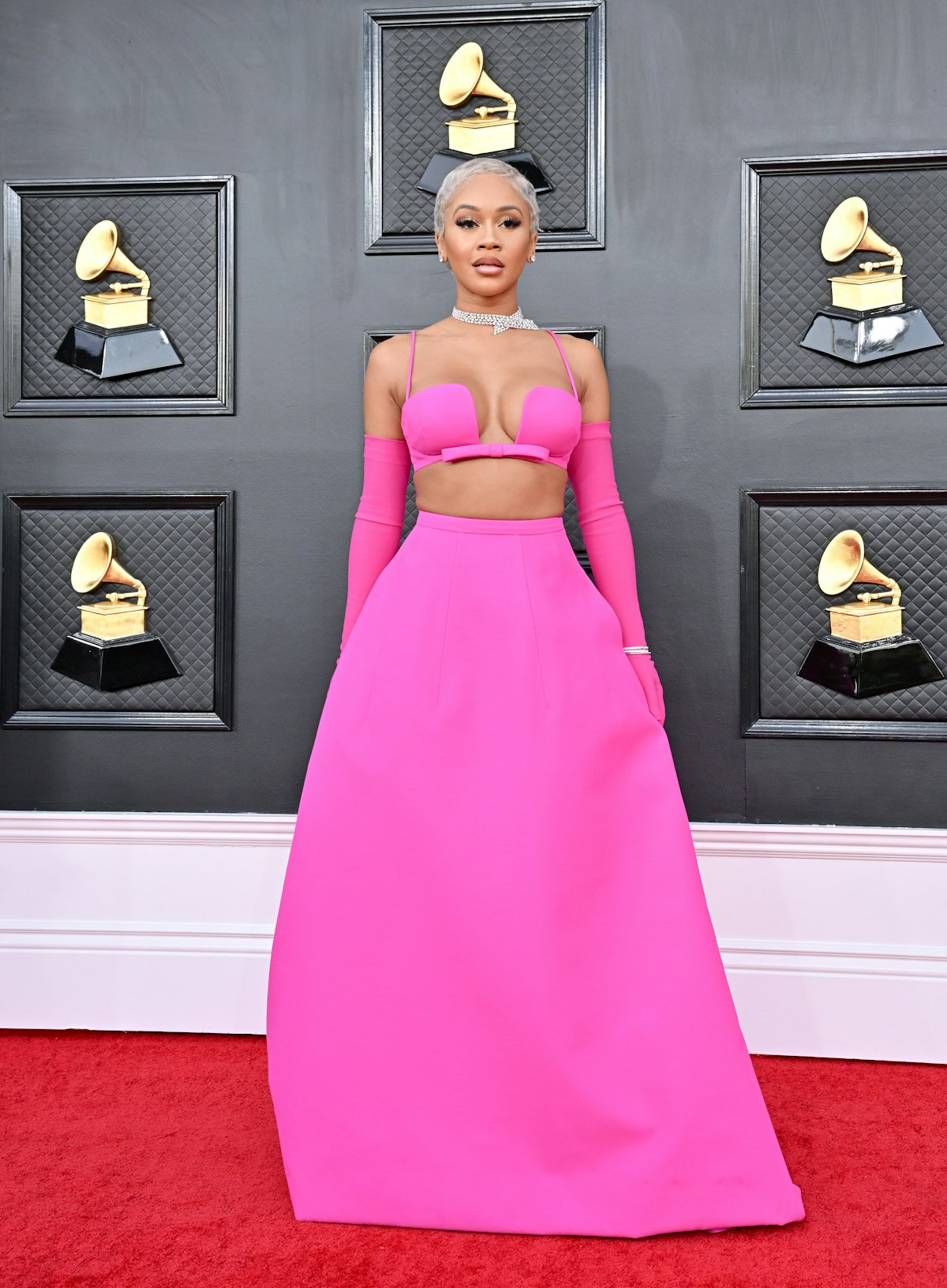 fuchsia dress red carpet @HunterSchafer wears a halter-neck dress in fuchsia silk georgette with tonal velvet panels from the McQueen Autumn Winter 2025 collection to the 77th Primetime #EmmyAwards, Los Angeles., Styled by