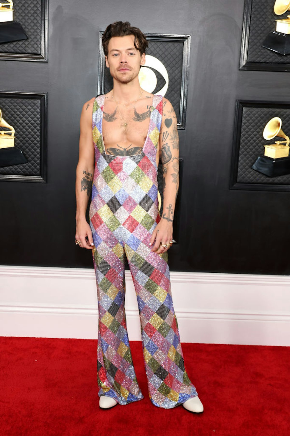 Harry Styles in a SwarovskiEncrusted Jumpsuit on the 2023 Grammys Red