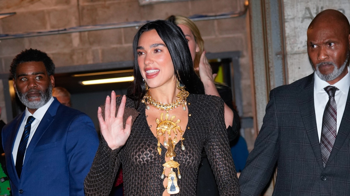 Dua Lipa Shows Off In Skin Tight Sheer Dress By Schiaparelli With Gold dua-lipa-shows-off-in-skin-tight-sheer-dress-by-schiaparelli-with-gold