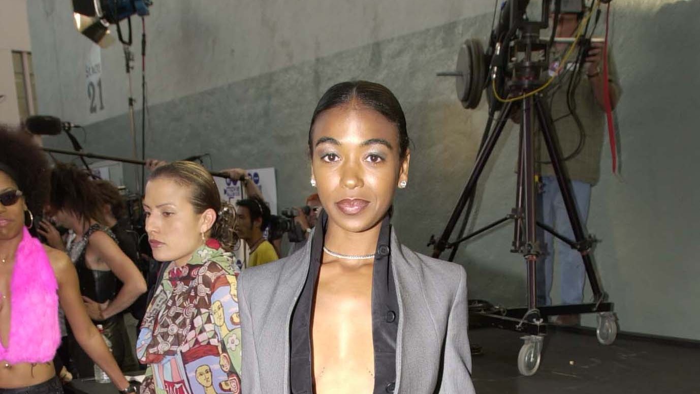 L'HISTOIRE: When Ananda Lewis Wore a McQueen Suit with Split Hem Pants in 2000