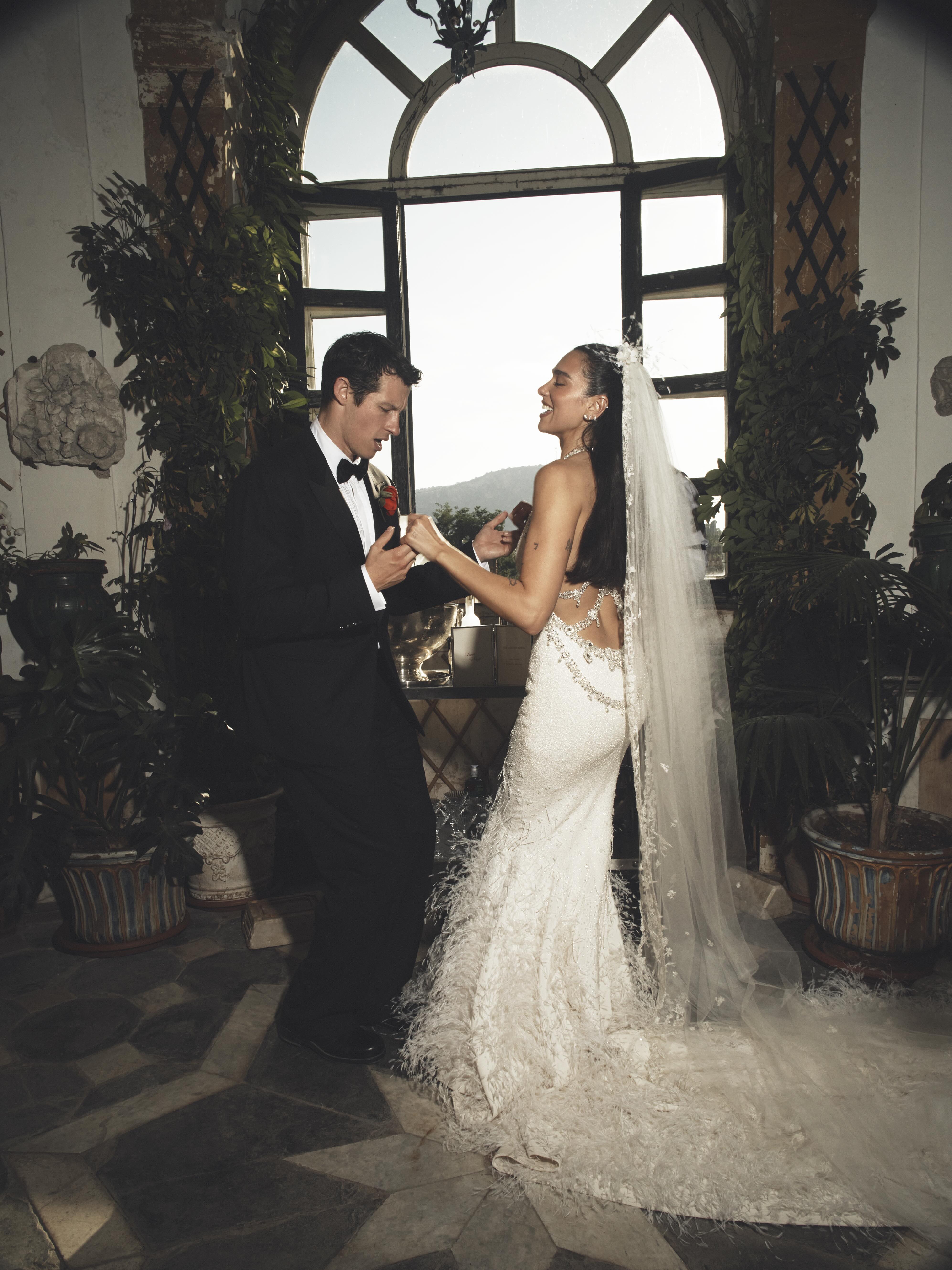 Dua Lipa in her custom Chanel haute couture wedding gown by Matthieu Blazy