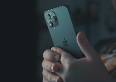 person holding silver iphone 6