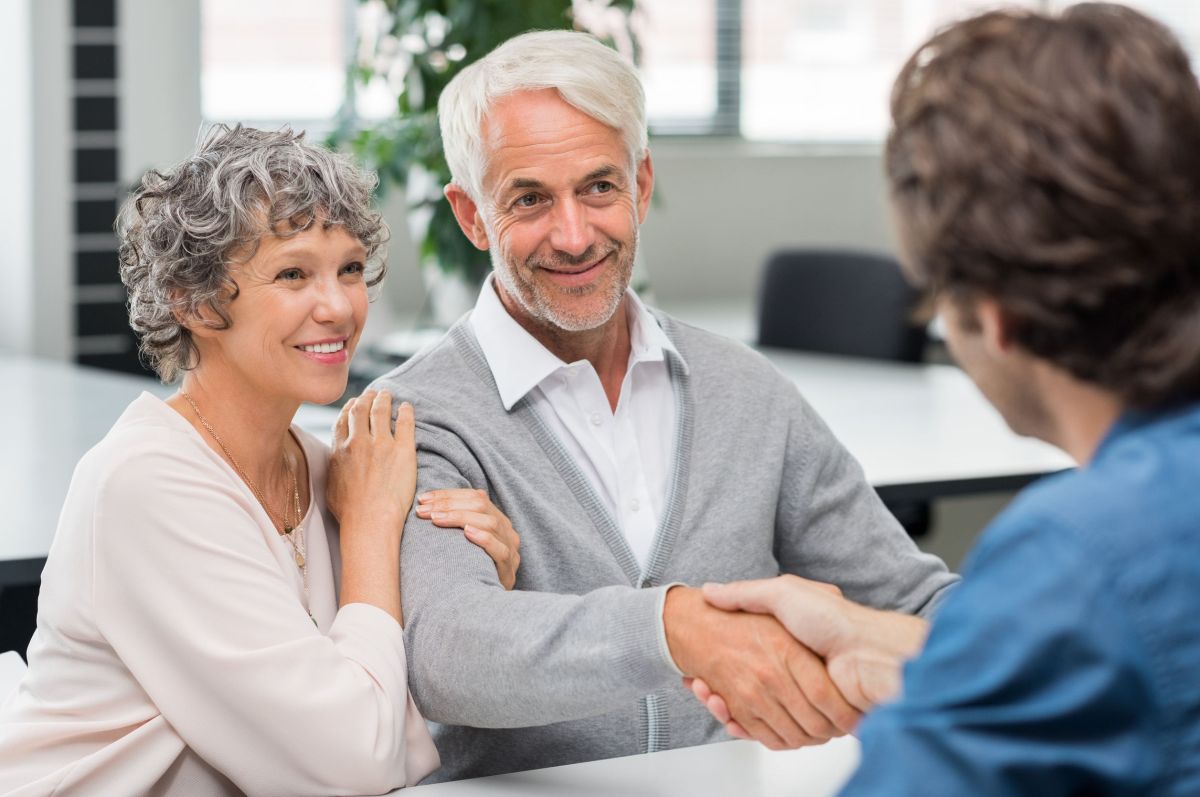 happy senior couple shaking hands with retirement consultant. smiling senior man shaking hands with young businessman for business agreement. handshake between senior man and financial agent after obtaining a loan.|Senior Taiwanese couple working at home|African american mentor salesman broker consultant explaining computer work to caucasian intern working with client showing online presentation looking at laptop negotiate on project or business deal.