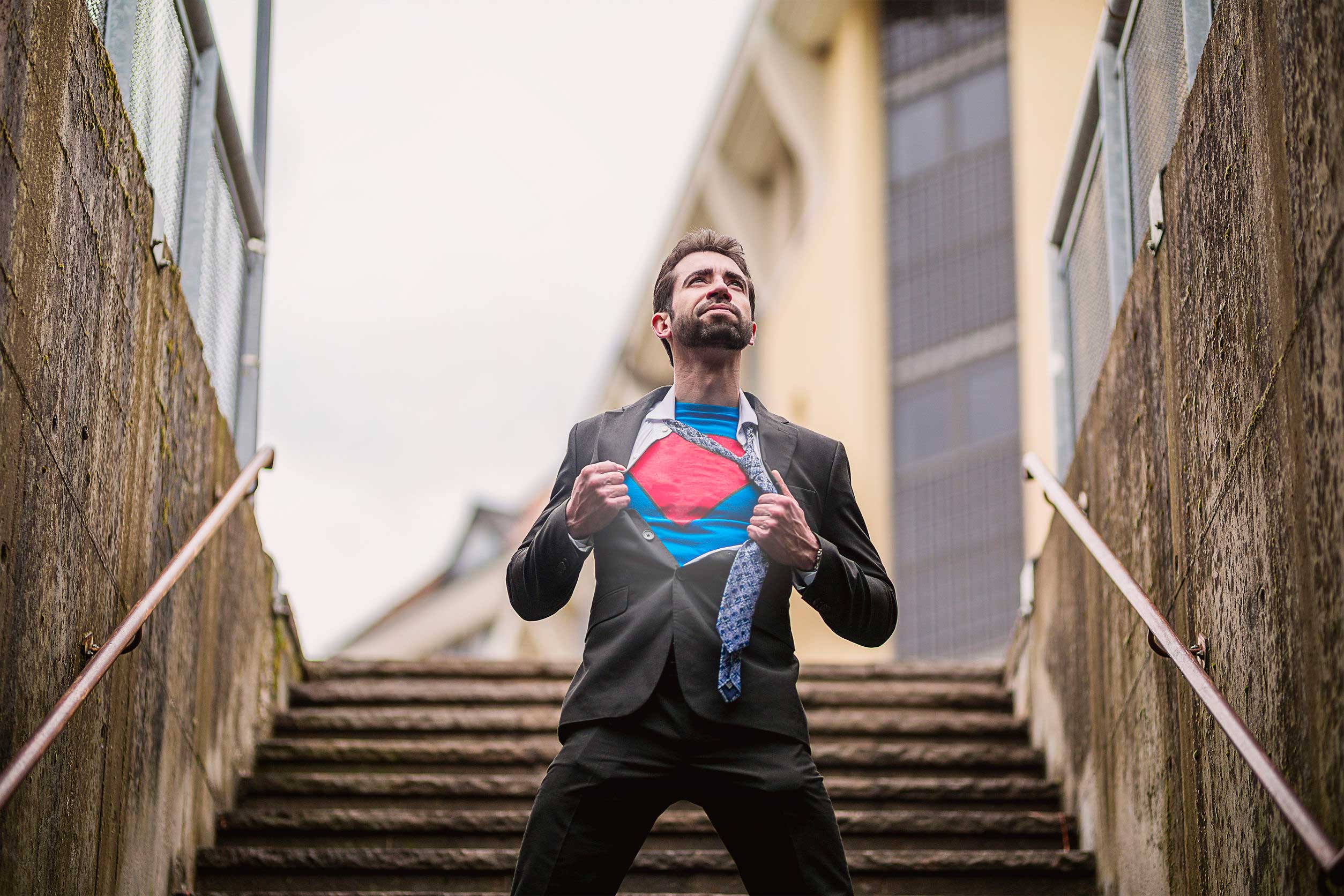 super-powers|confident businesswoman who is working with an elderly client|Congratulations! Two cheerful young men sitting at the wooden desk in office and shaking hands while two beautiful women looking at them and smiling