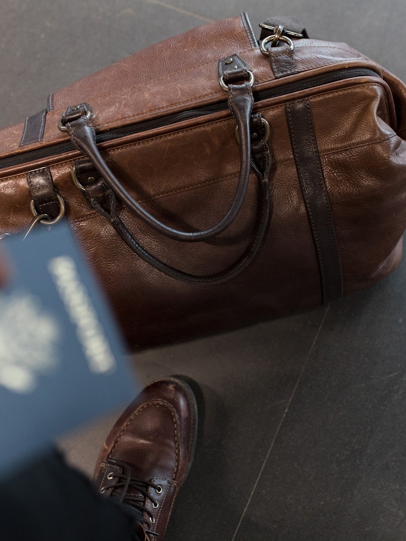 Man with leather bag