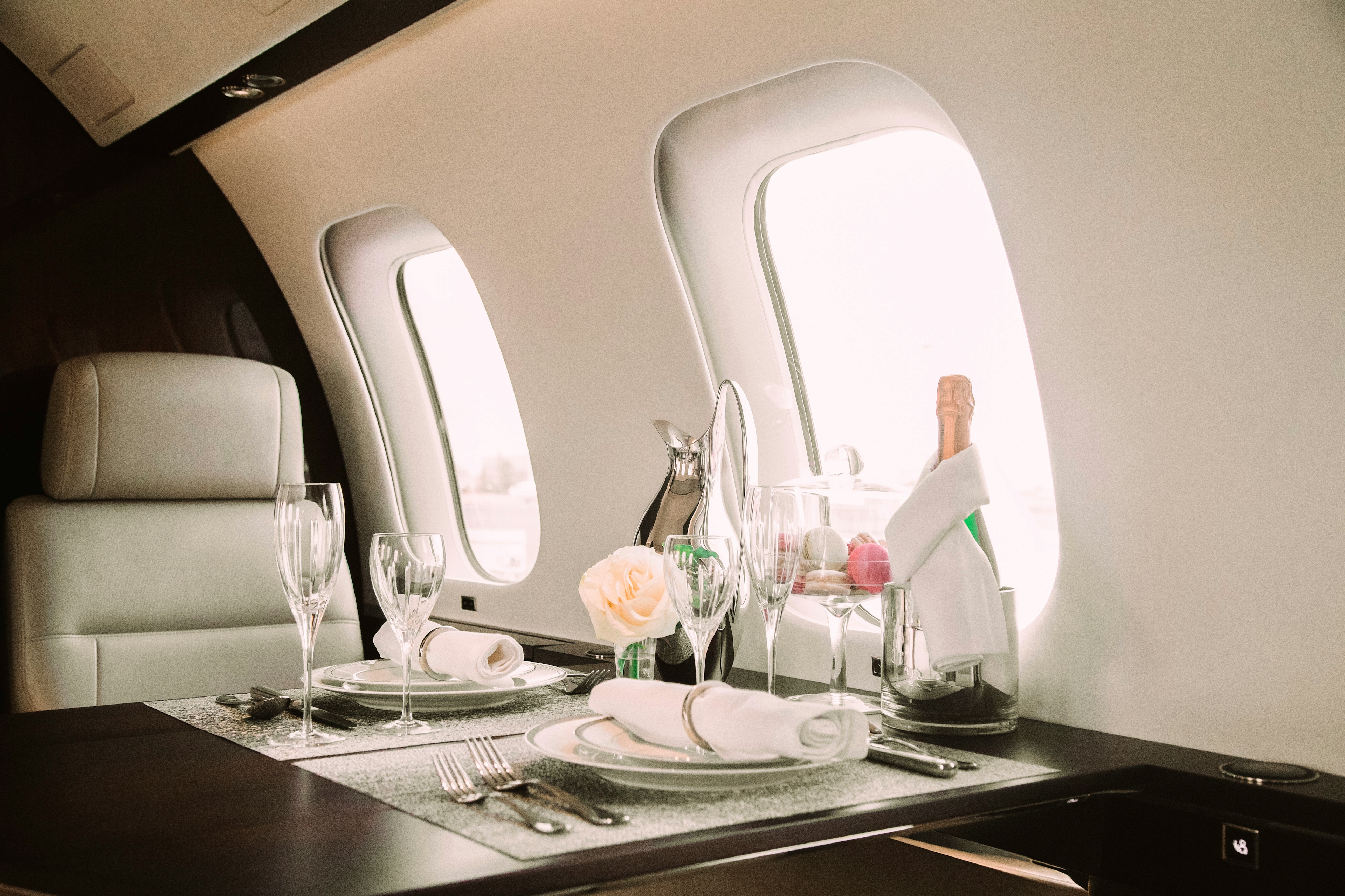 https://www.datocms-assets.com/40358/1641401694-nside-a-business-jet.jpg