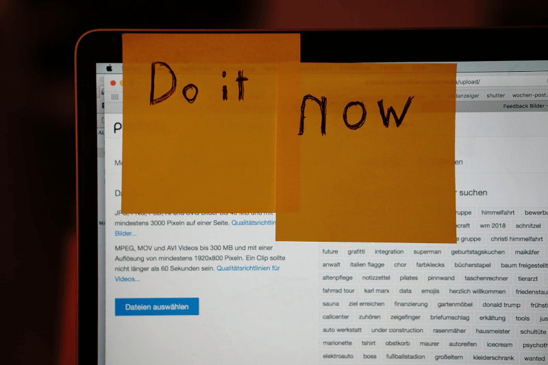 pos-it notes stuck to a monitor that say to do it now