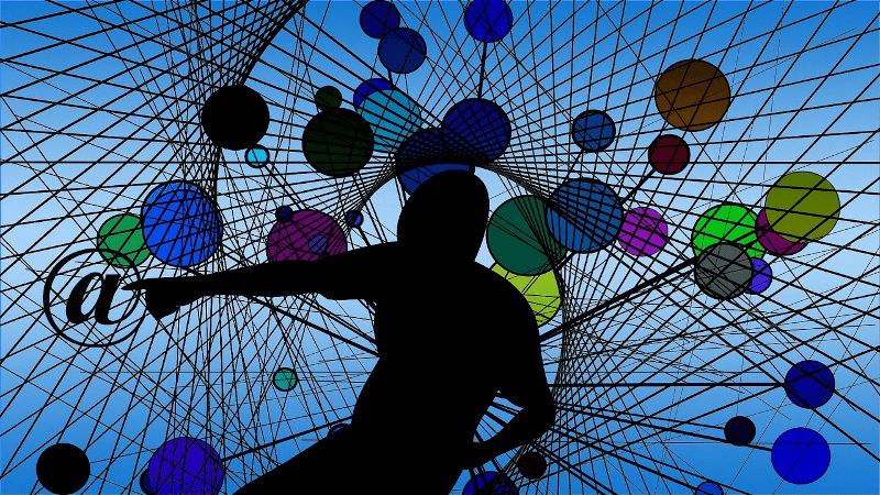 silhouette of person standing in the middle of a web of links