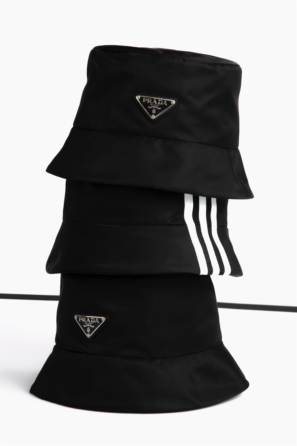 https://www.datocms-assets.com/40484/1641911909-prada_x_adidas_highsnobiety_still_life_02_066_second_edit_r2.jpg?auto=format