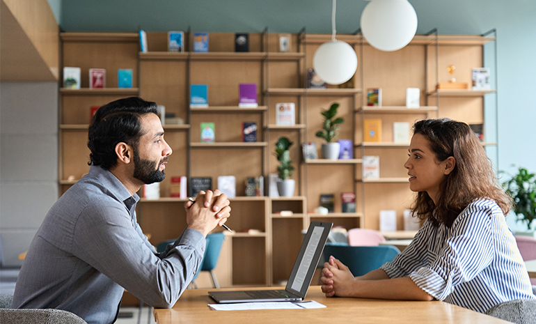 manager talking to an employee compassionately