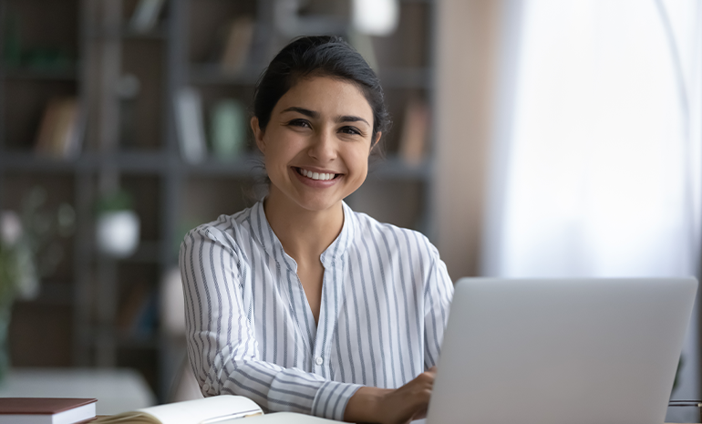 An employee who looks satisfied while working