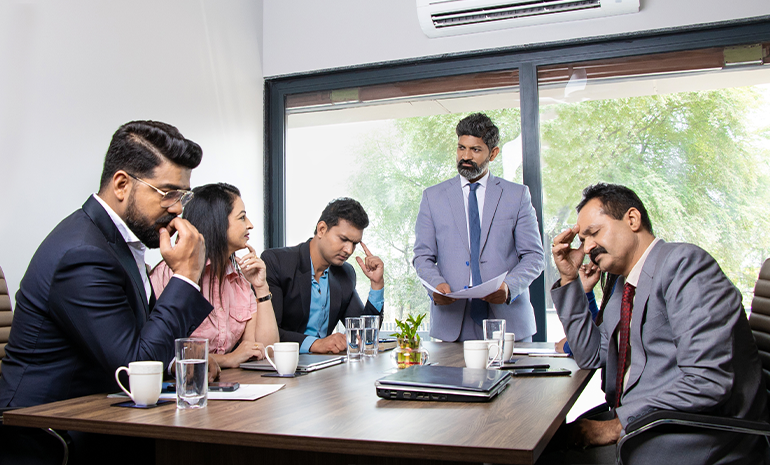 A group of employees are unhappy or disagree with another employee