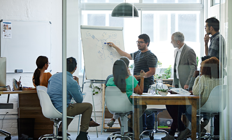 Employees from different backgrounds in a meeting
