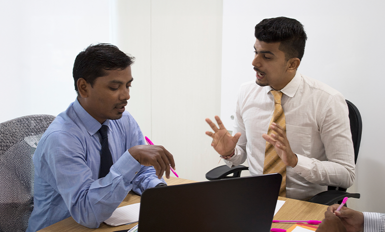Two employees arguing