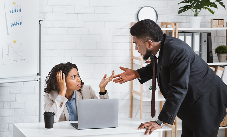 Two frustrated employees arguing