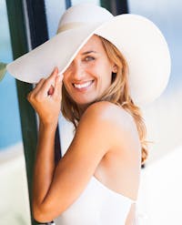 woman with a hat on
