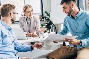 Employees having a meeting
