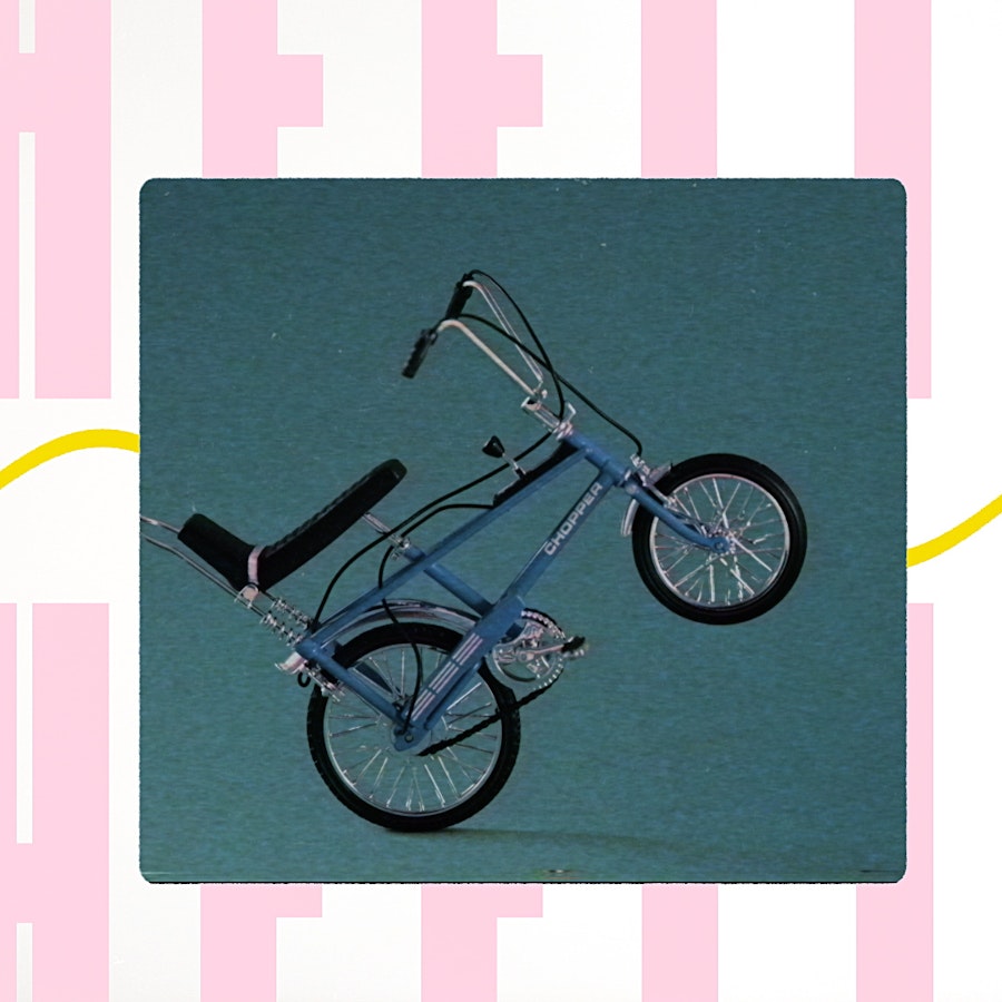 image of toy raleigh chopper on a stylised background