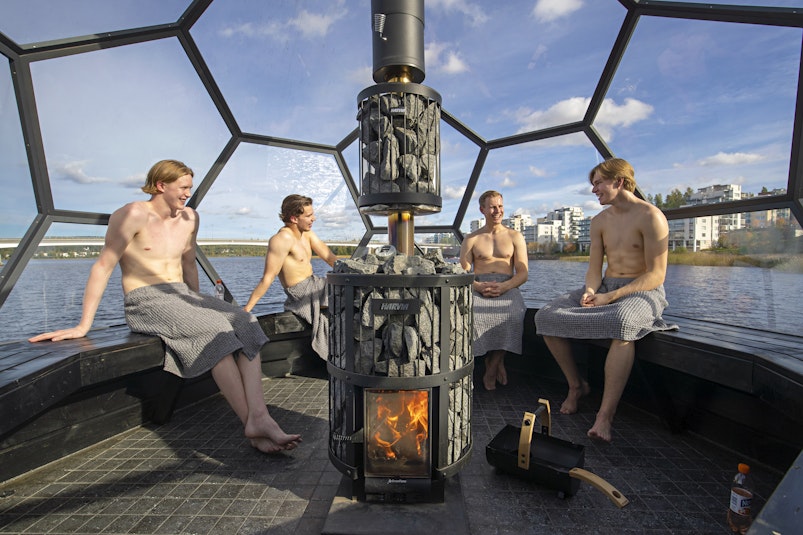 Group of men enjoying the sauna