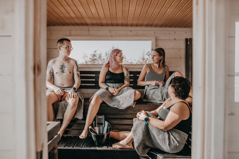 people conversating in sauna